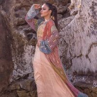 Mix weave Long Crochet jacket with worked silk blouse and net skirt