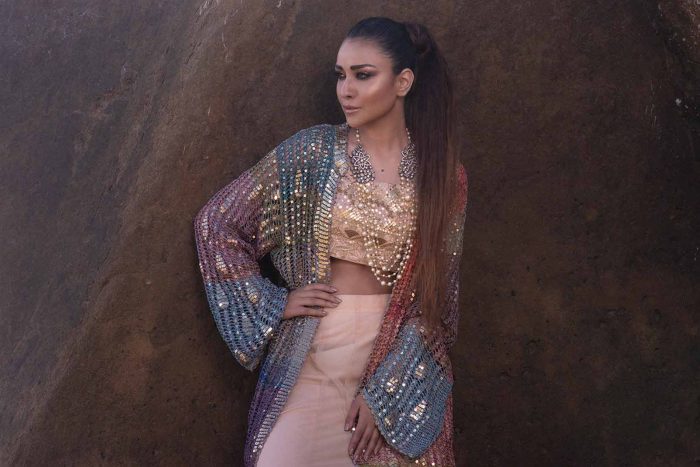 Mix weave Long Crochet jacket with worked silk blouse and net skirt