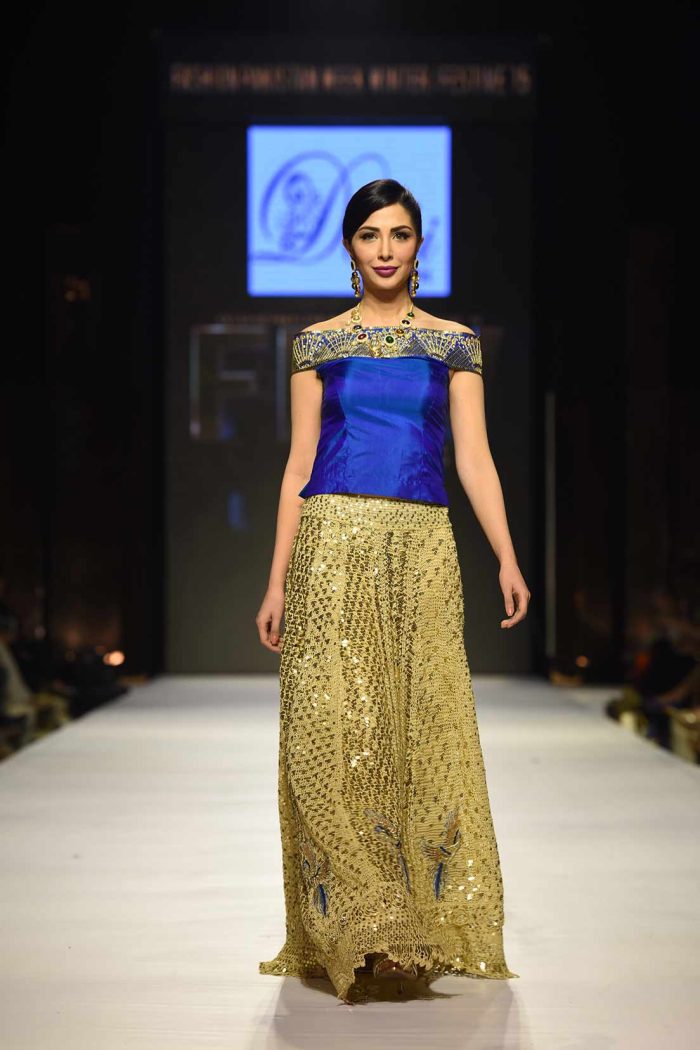 Gold Lehnga choli with Zardozi birds